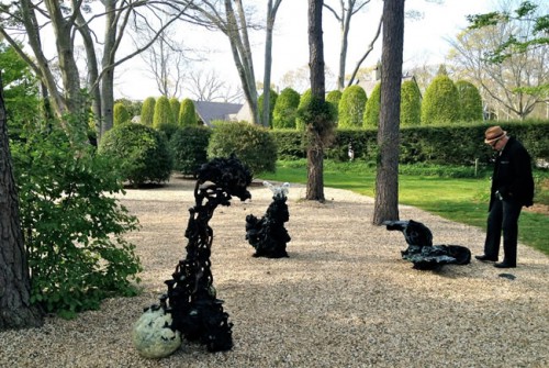 Three Sculptures, checking them before the reception,  Longhouse Reserve, April 2012
